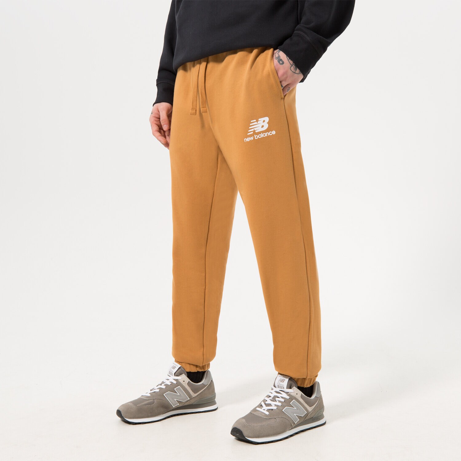 pánské kalhoty NEW BALANCE KALHOTY  NB ESSENTIAL STACKED MP31539TOB HNĚDÁ