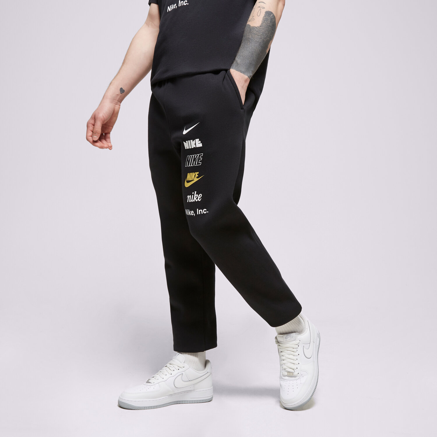 pánské kalhoty NIKE KALHOTY  M NK CLUB+ BB CF PANT MLOGO DX0795-010 ČERNÁ