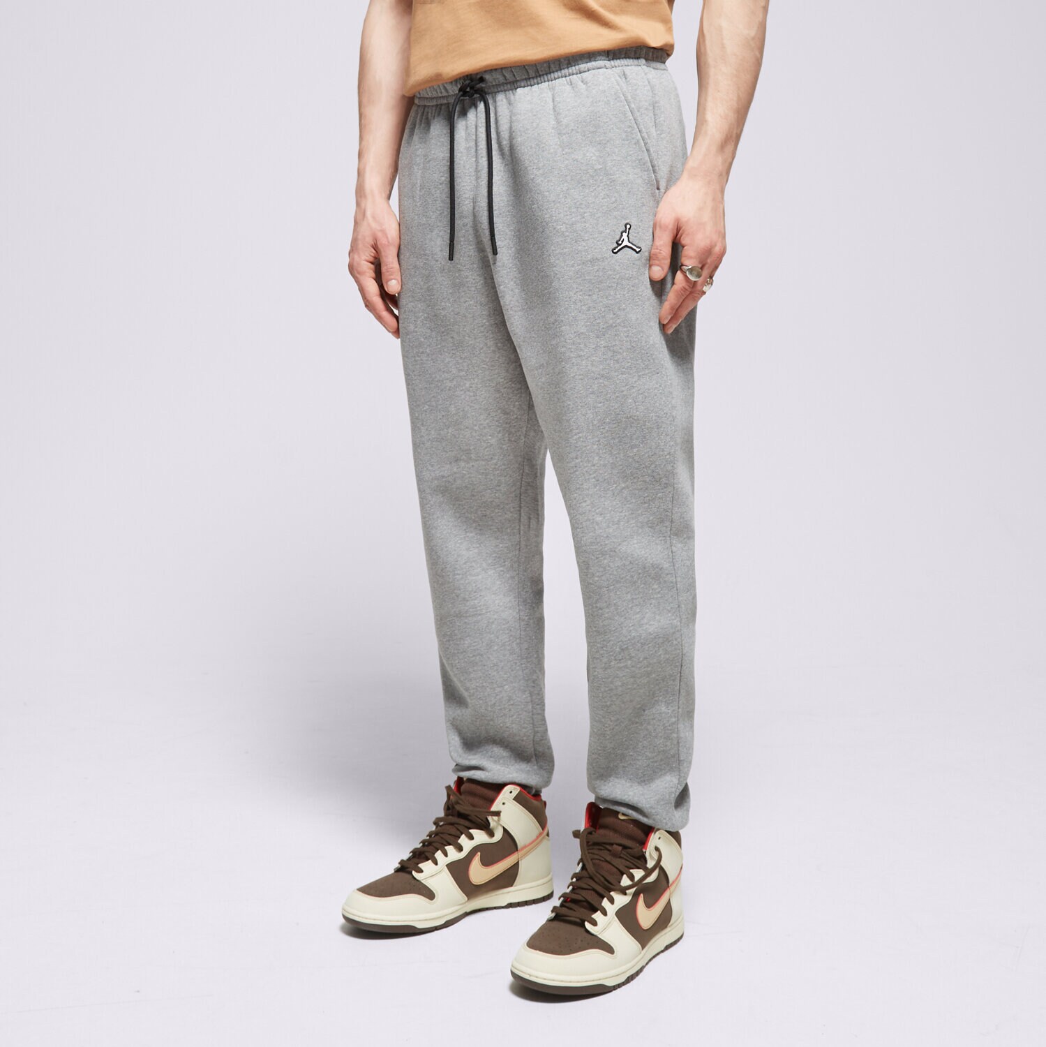 pánské kalhoty JORDAN KALHOTY  M J ESS FLC PANT DQ7340-091 ŠEDÁ