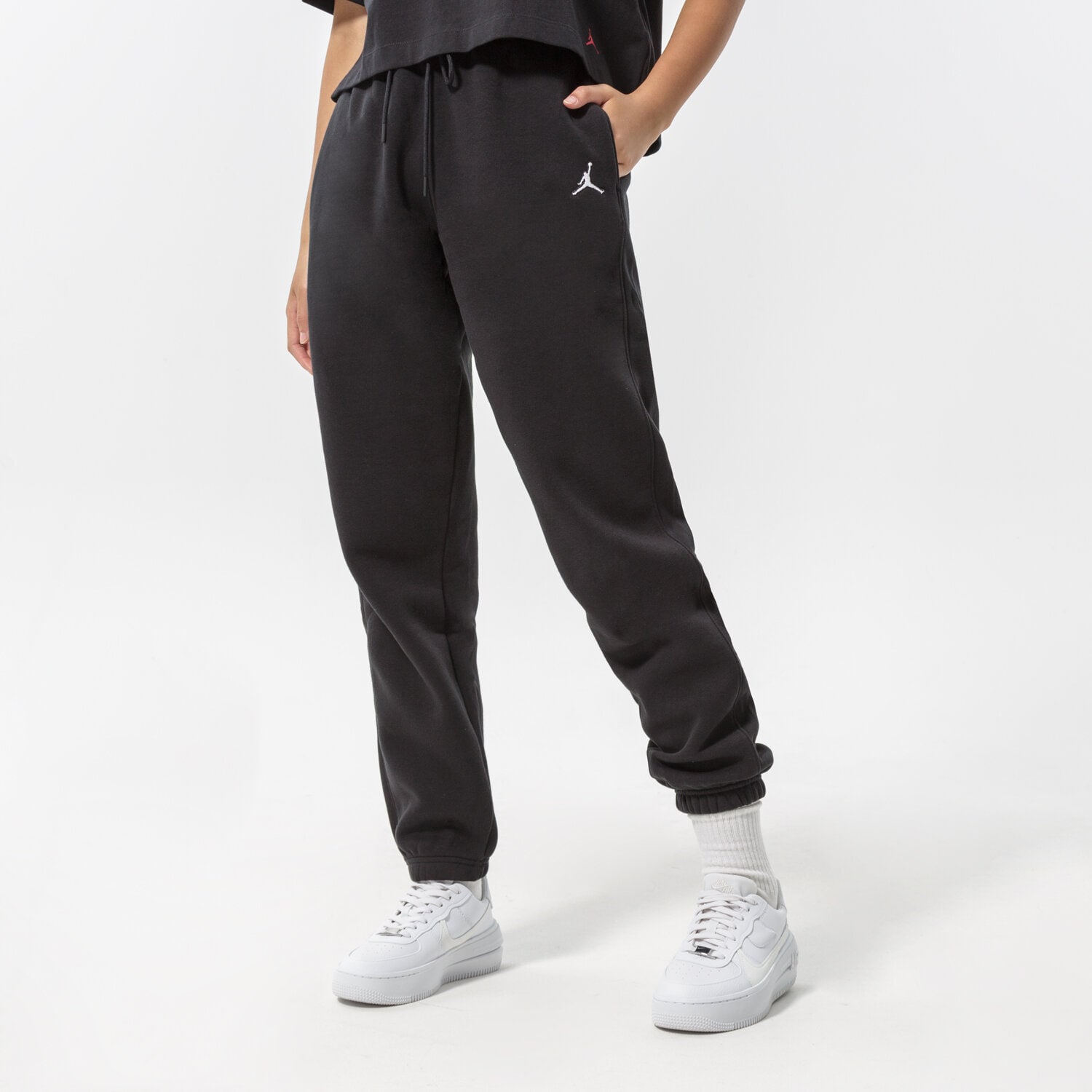 dámské kalhoty JORDAN KALHOTY  ESSENTIAL JOGGERS WOMEN'S DQ4478-010 ČERNÁ